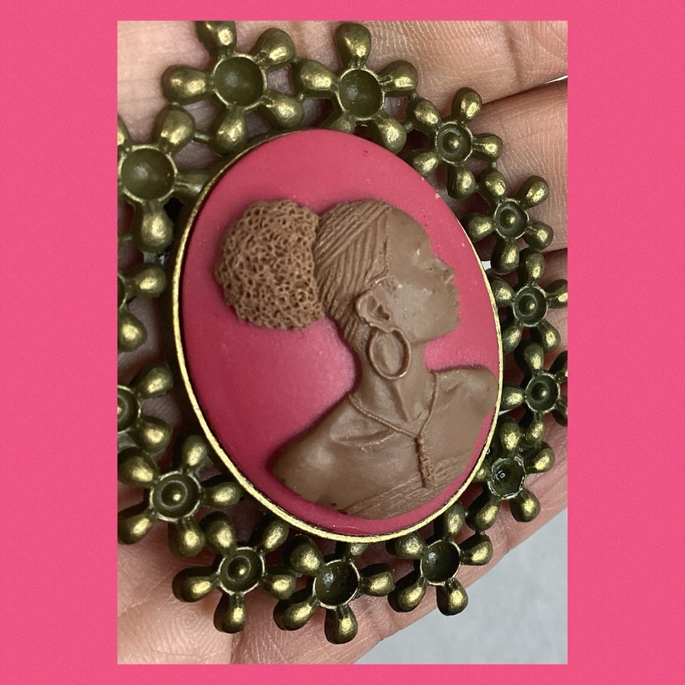 Pink and bronze with black beads cameo necklace.